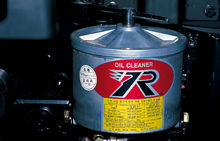 sivler metalic cylindrical engine oil cleaner