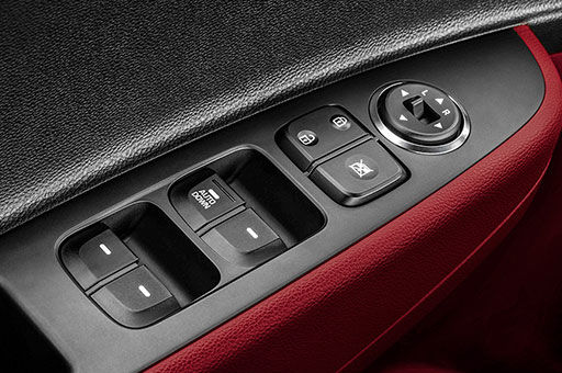 Rear power window buttons on the armrest