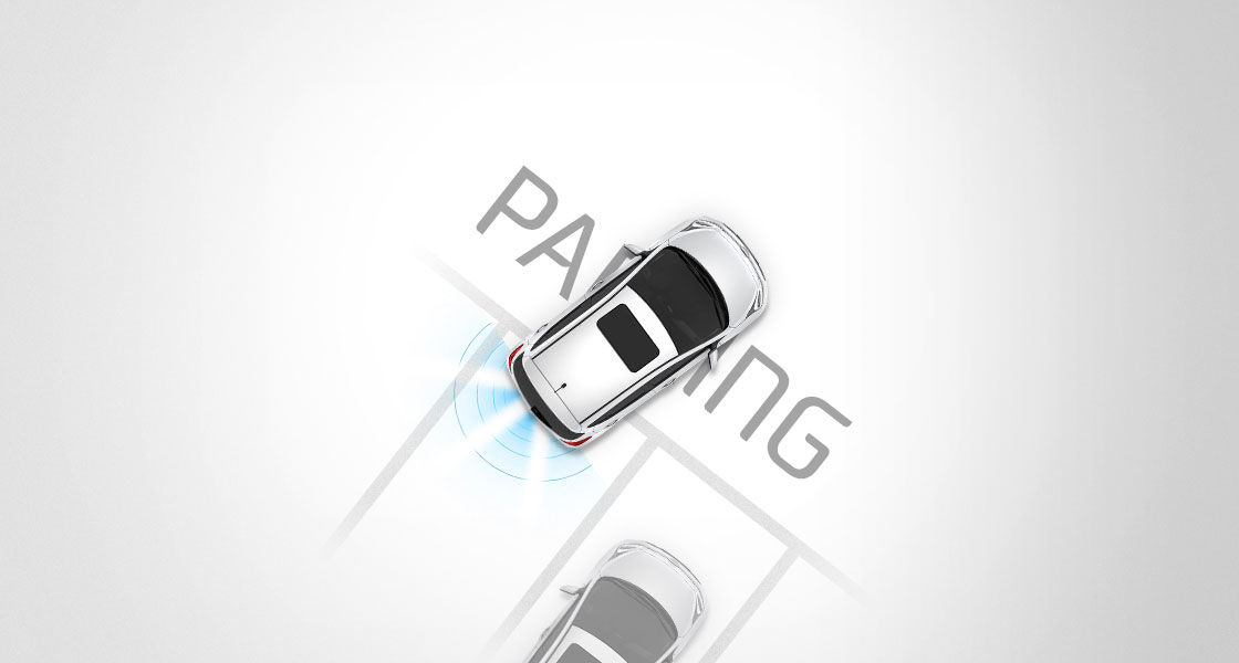Top view of white i10 parking with rear parking assist system
