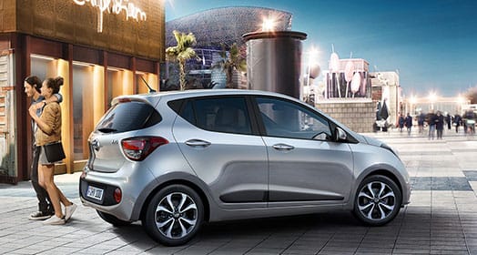 Side view of silver i10 parked outdoor