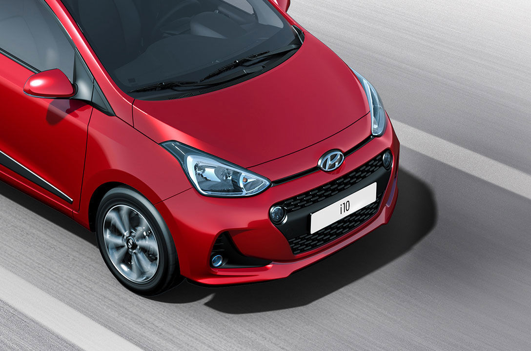Cropped view of front part of red i10