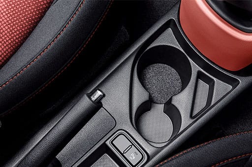 Cup holders between front seats