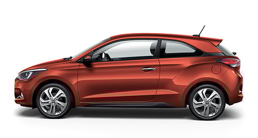 Left side view of orange i20 coupe