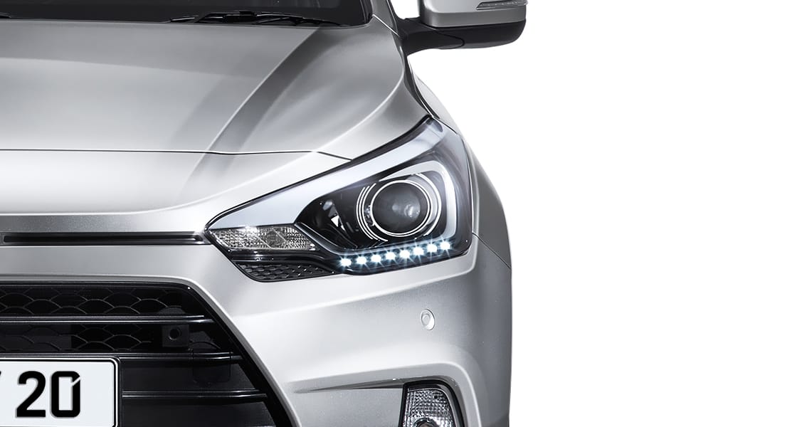 Closer view of projection headlamp with LED daytime running light