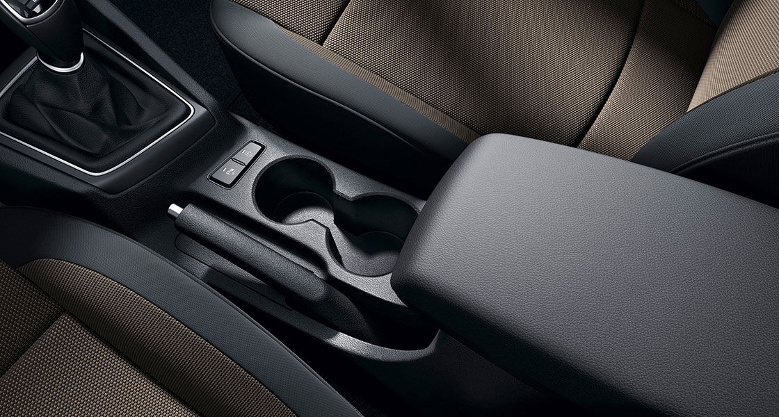 Cup holder with the center console