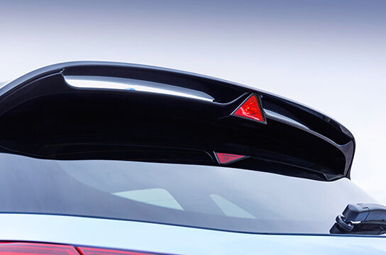 Rear spoiler and triangular brake light.