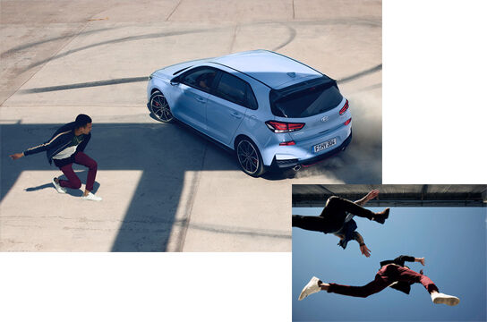 Two people jumping below 