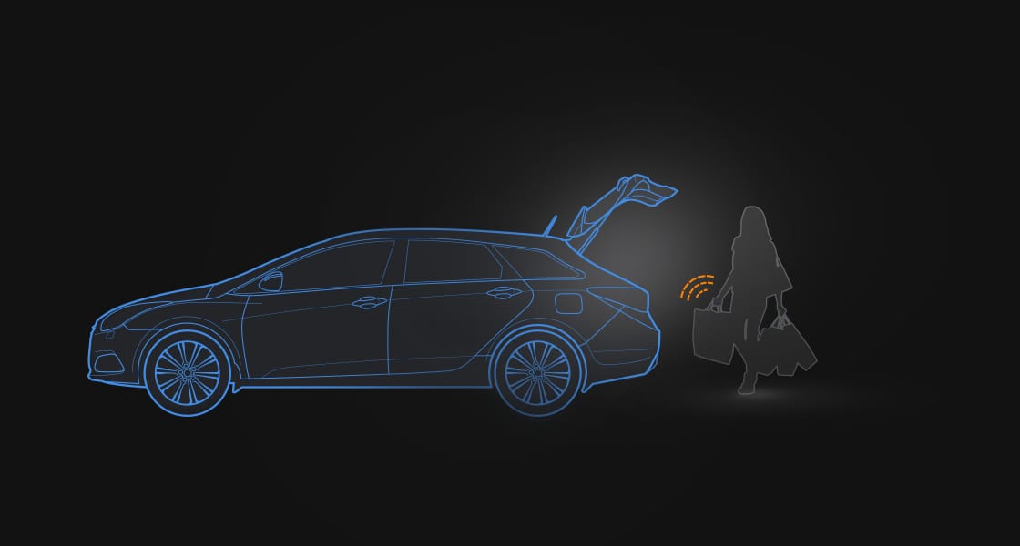 Illustrated view of a person approaching to the trunk and trunk door opens