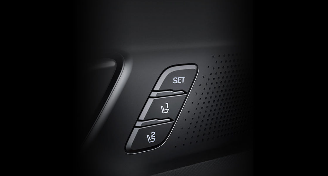 Integrated memory seat control buttons