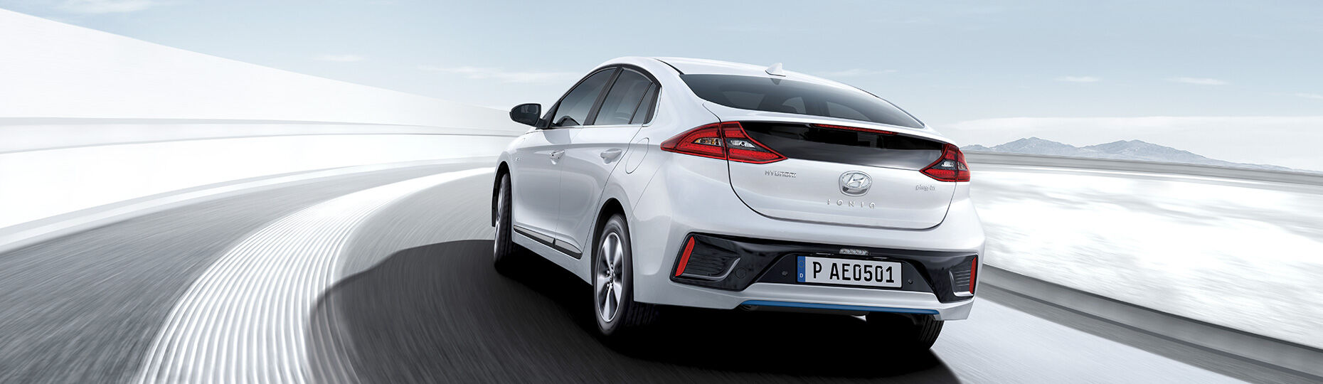 Side front view of white Ioniq plug-in Hybrid