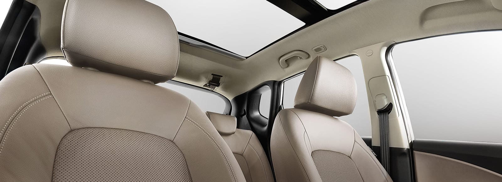 Low view of beige interior with sunroof