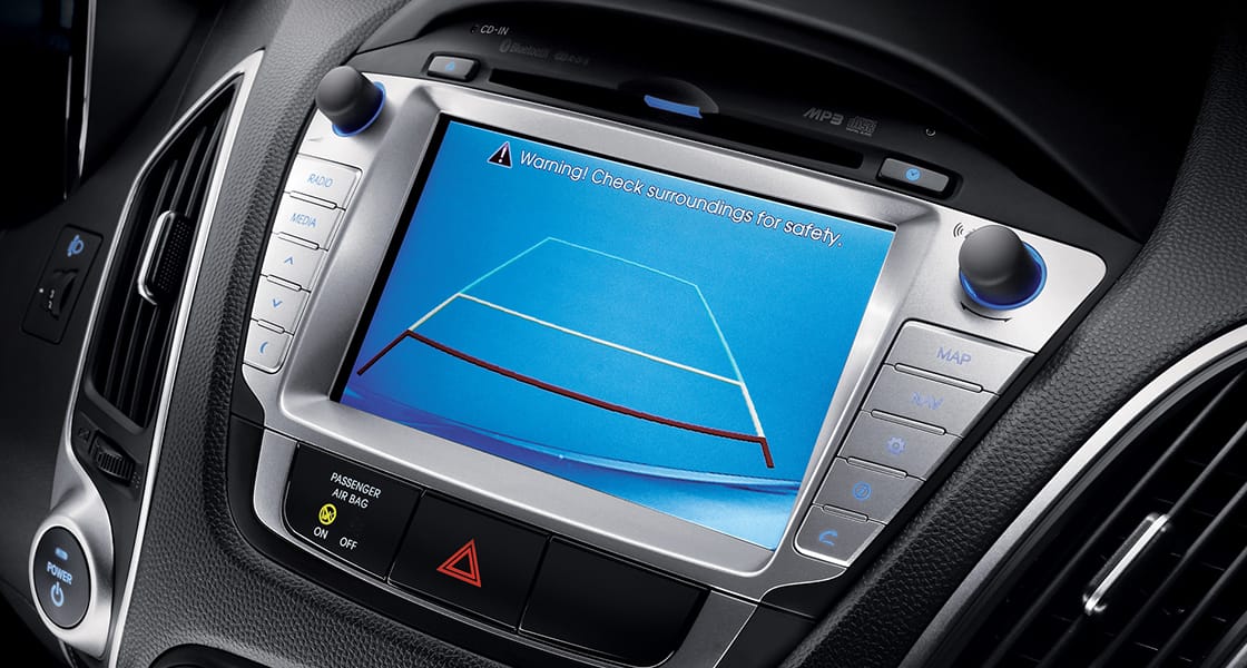 Rear parking assistance system screen on center fascia