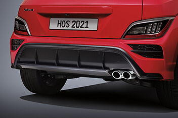 bumper with twin tip muffler