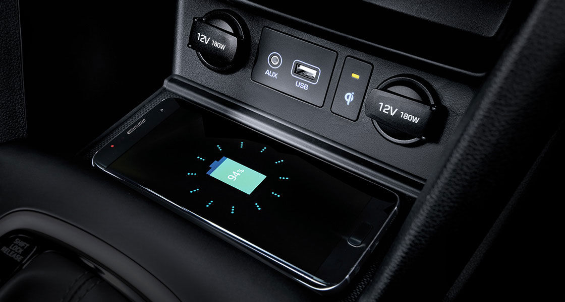 https://www.hyundai.com/content/dam/hyundai/template_en/en/images/find-a-car/pip/kona/convenience/kona-os-convenience-wireless-phone-charging-pc.jpg