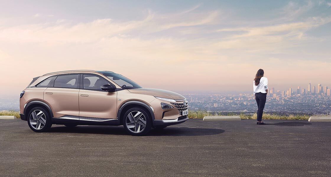 nexo 2019 side view with woman