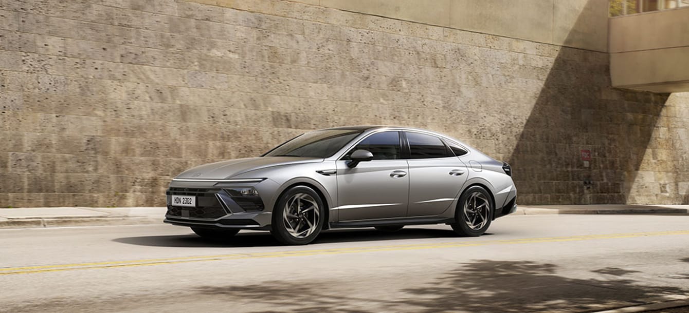 Side image of gray The new SONATA on the road