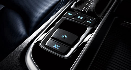 Integrated driving mode system buttons below transmission