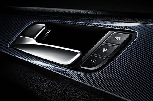 Integrated memory system button next to inside door handle