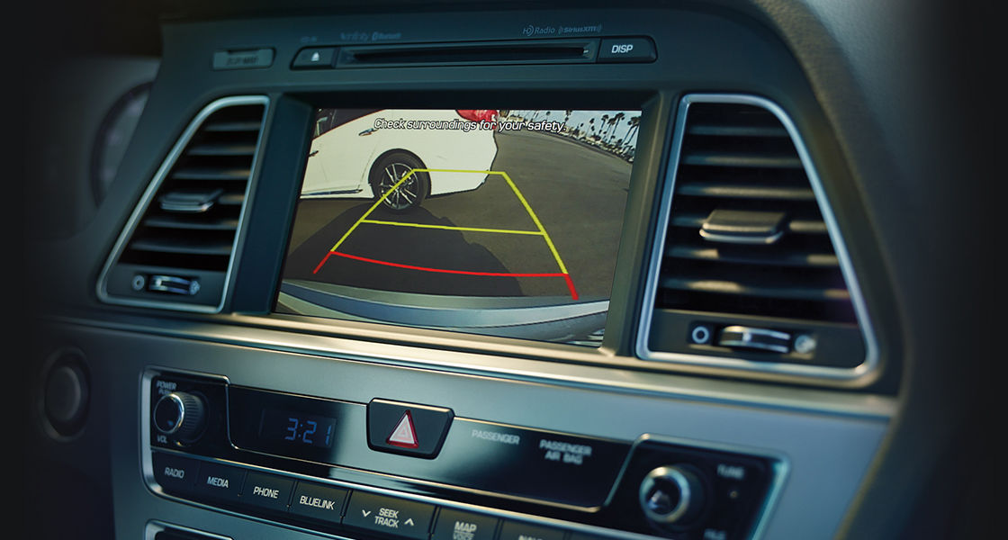 Parking assist system on rear view display on the center fascia
