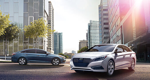 Two Sonata Plug-in Hybrid parked in the city