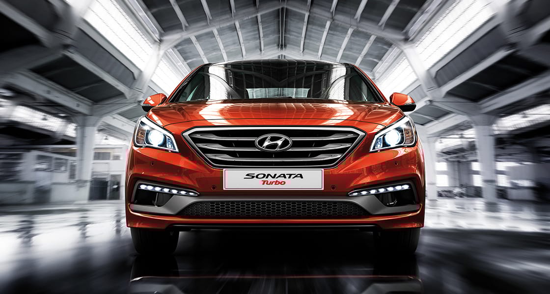 Front view of red Sonata Turbo