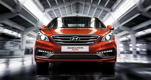 Front view of red Sonata Turbo