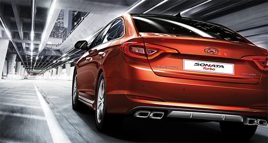 Rear view of red Sonata Turbo