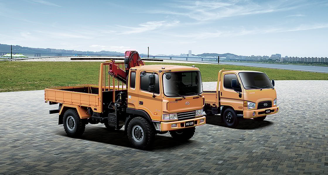 front view of orange 4 wheel drive truck