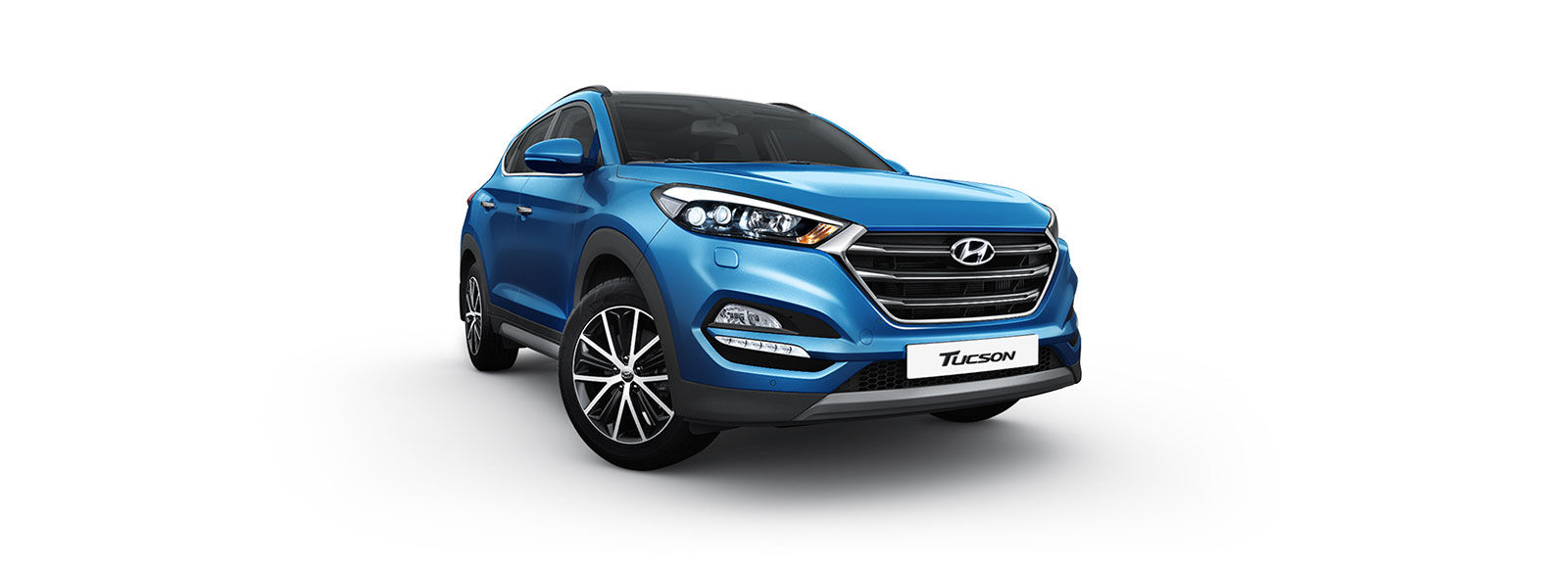 Side front view of blue Tucson