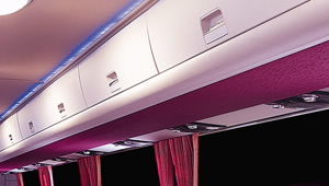 image of universe bus overhead luggage compartment