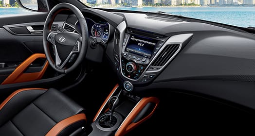 Front seat and cockpit interior in orange color