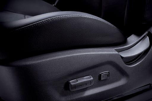 Driver’s power seat with control button