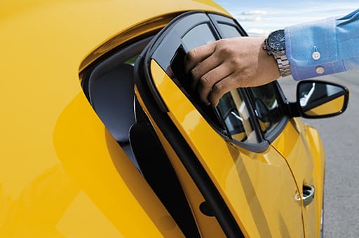 Person openind the rear door with hidden door handle