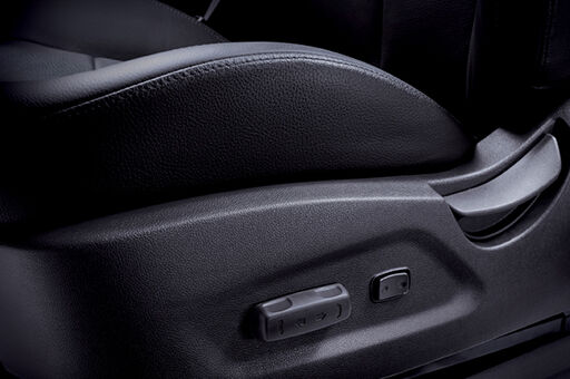 Driver’s power seat control button