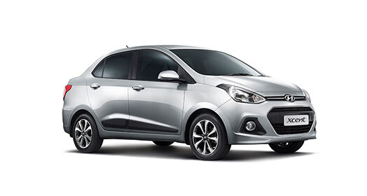 Right side front view of silver Xcent