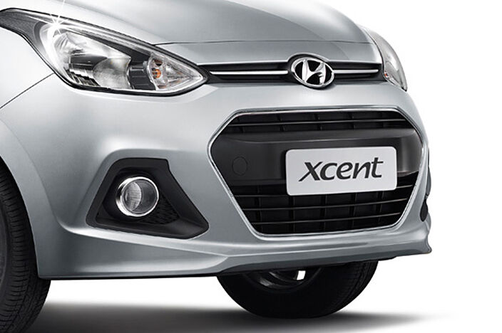 Radiator grille with Xcent logo