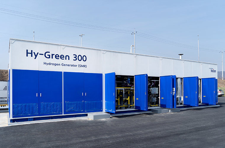 A Hyundai Generator building with blue doors and the words Hy-Green 300 written on the front.