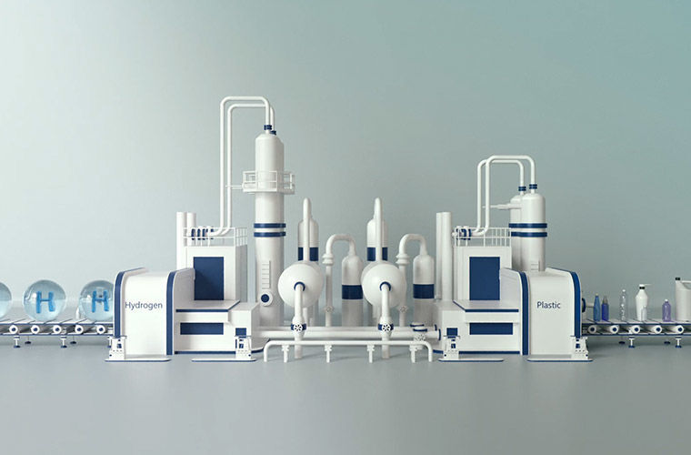 The equipment required to turn plastic waste into hydrogen all lined up in a lab with hydrogen written on the left hand side and plastic on the right.