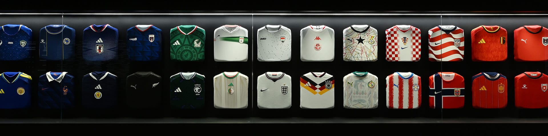 Promotional image of the FIFA Museum Presented by Hyundai’s “Legacies of Champions” exhibition, featuring jerseys from all 48 national teams participating in the FIFA World Cup 2026™.