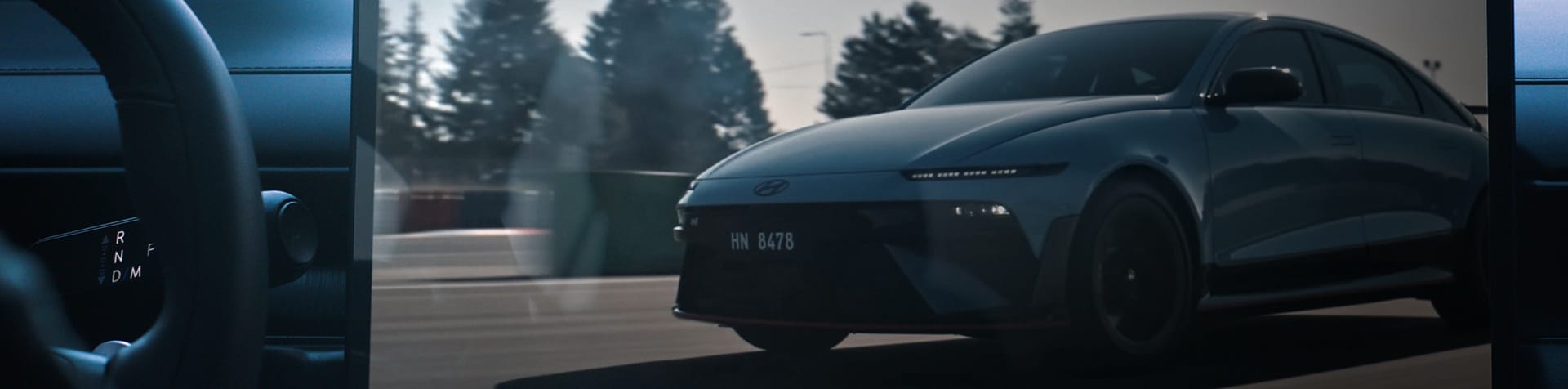 Hyundai vehicle driving on the road, highlighting the brand's next-generation Software-Defined Vehicle vision.