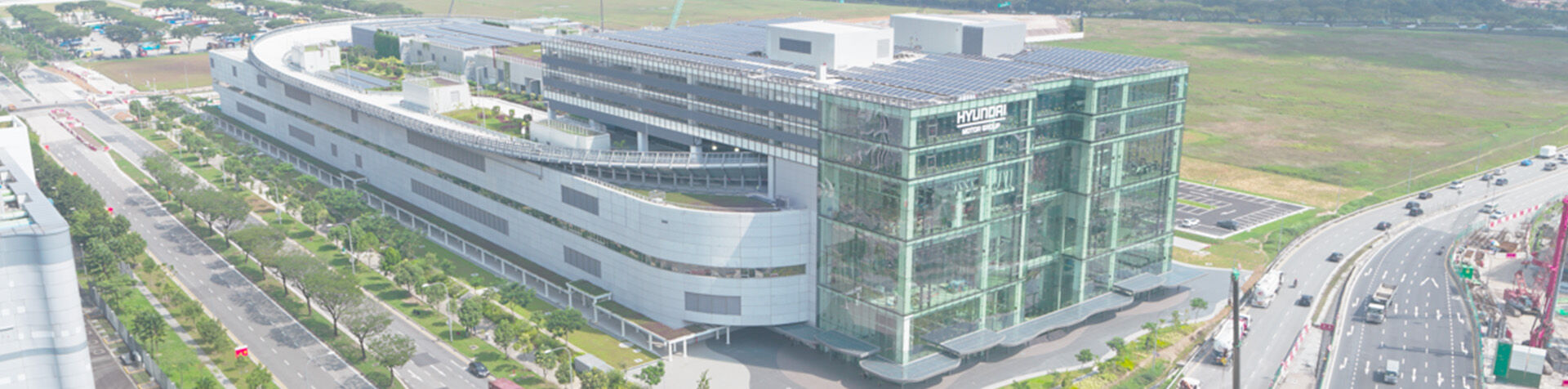 A drone shot of the external façade of the HMGICS.