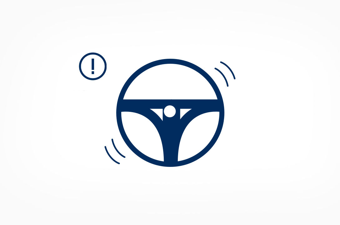 A steering wheel warns driver as it detected distracted driving.