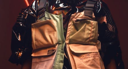 Black jacket and orange and green vest made of upcycled materials from Hyundai’s Re:Style 2020 collaboration with designers.