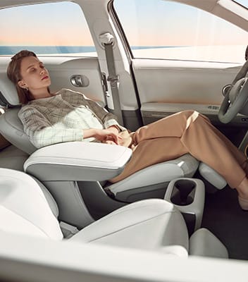 woman sitting in the front seat