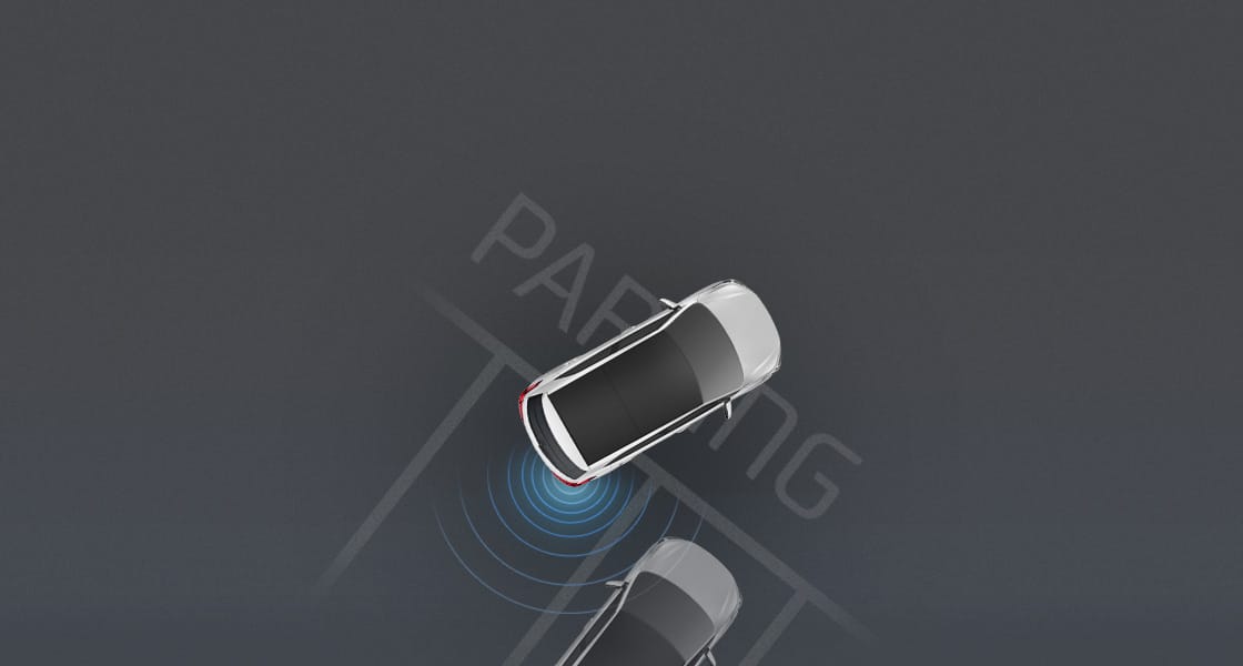 Top view of white Creta parking with rear parking sensors