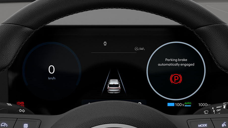 A message is displayed on the screen in front of The all-new KONA's steering wheel, informing that the auto P gear has been activated.