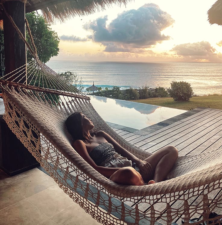 lying in a hammock