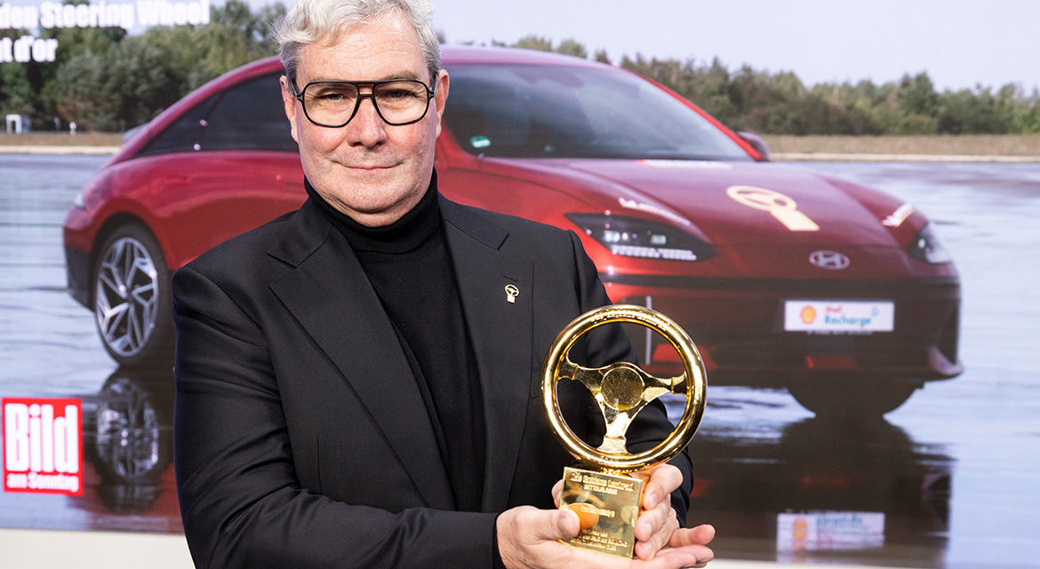 Luc Donckerwolke, President of Hyundai Motor Group & Chief Design Officer Global Design Division, receives the "Golden Steering Wheel 2023" award for the Hyundai IONIQ 6.
