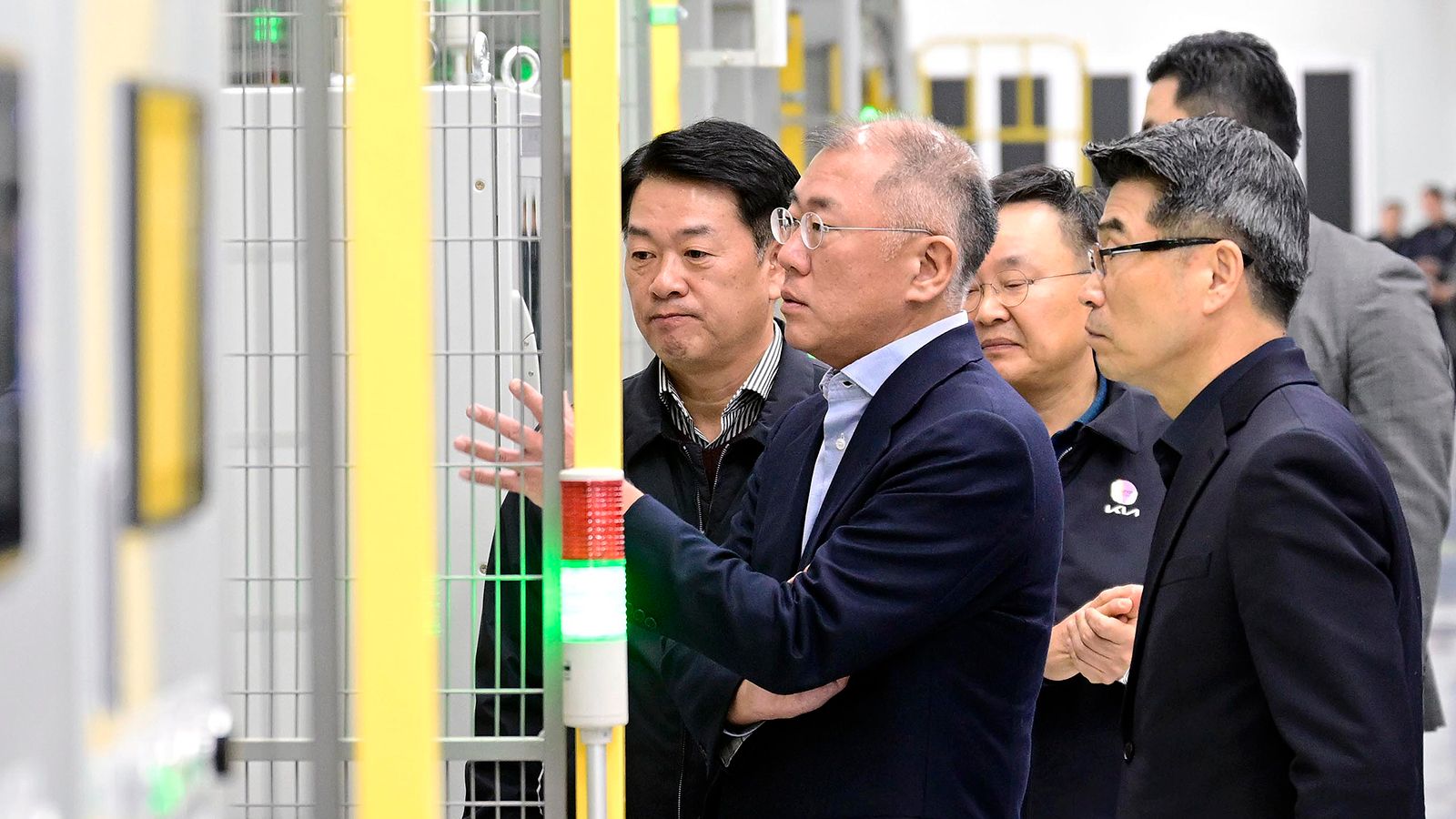 Hyundai Motor Group Executive Chair Euisun Chung looks around Kia AutoLand Gwangmyeong and encourages the employees
