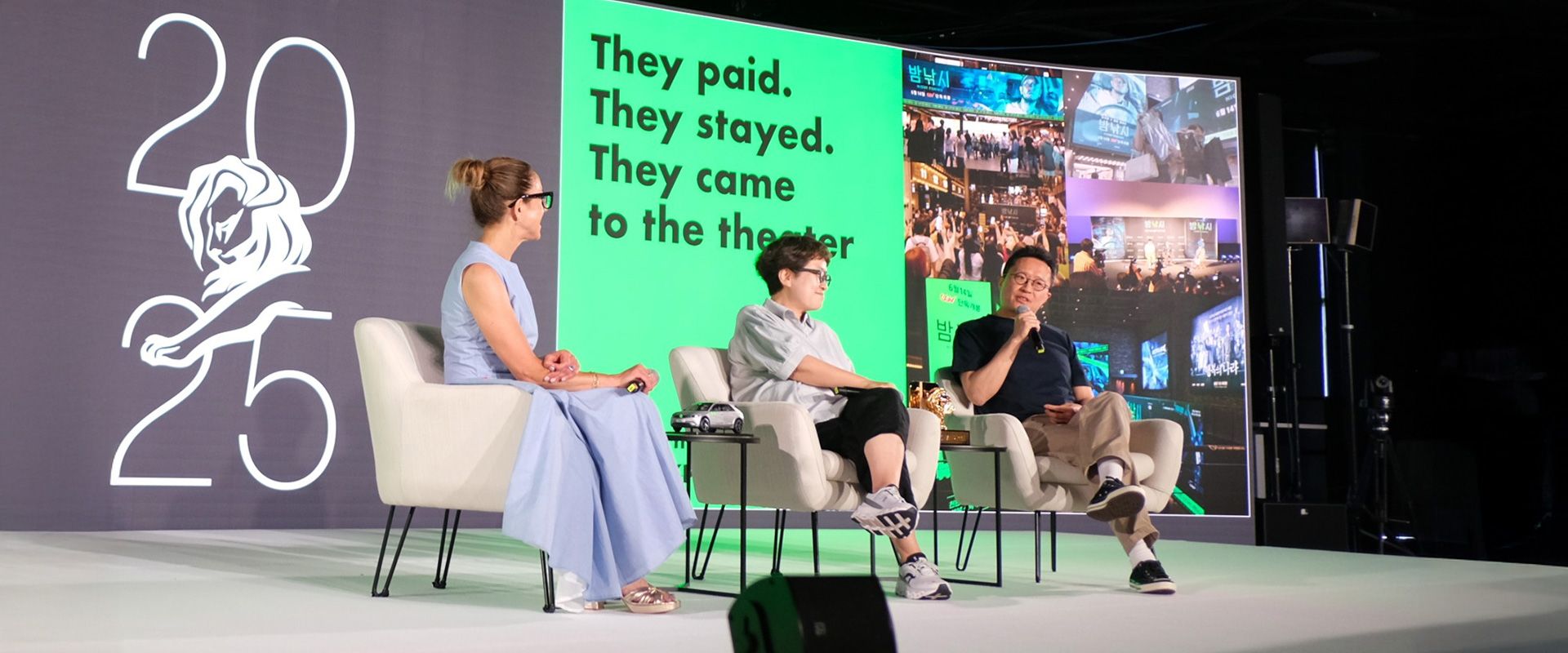 Sungwon Jee and Jung A Kim on stage with moderator
